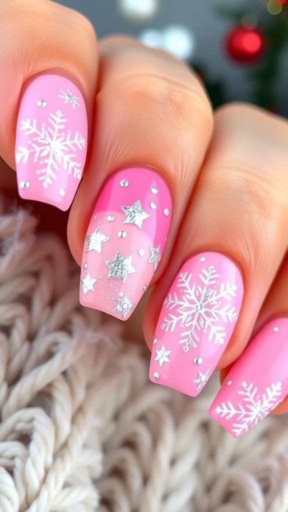 Close-up of pink Christmas nails with snowflakes and glitter.